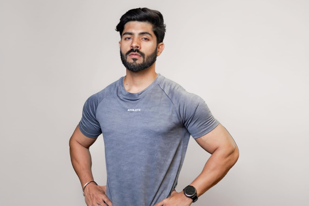 Man in sportswear holding a cricket bat